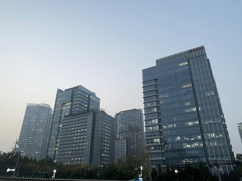 Modern glass skyscrapers against a clear sky